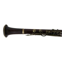 Early 20th century rosewood clarinet by Geo. Potter & Co Aldershot, together with a flute in fitted case, the lid with label reading Edward Potter