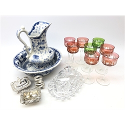  Eight Bohemian style coloured bowl hock glasses on faceted stems, heavy cut glass cheese dish and cover, blue & white toilet jug and bowl and a three piece Sheffield silver-plate condiment set  