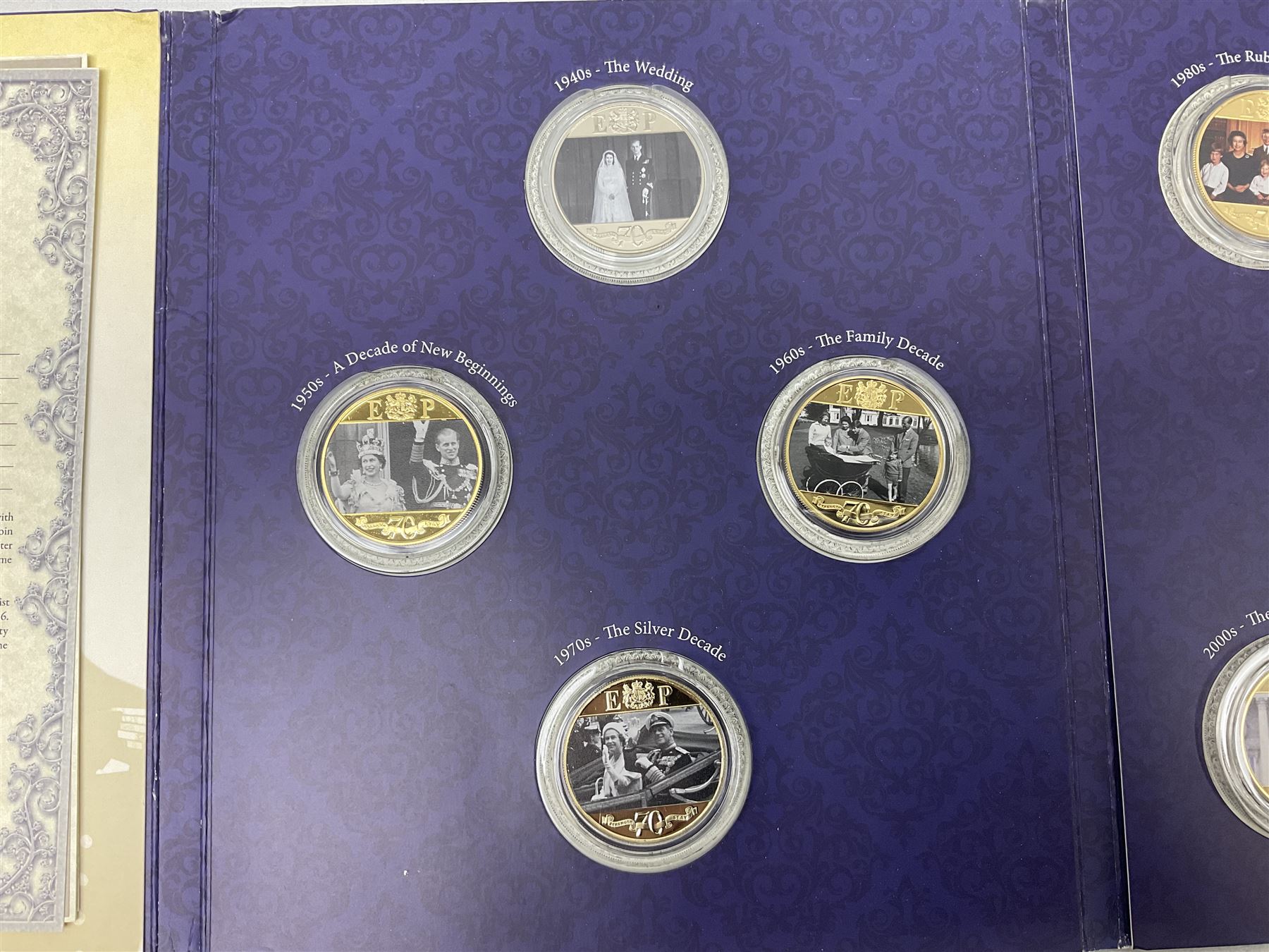 The Royal Mint United Kingdom 2006 brilliant uncirculated coin collection, in card folder and a part set of The London Mint Office 'The Platinum Wedding Anniversary Photographic Collection' coins