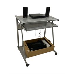 LG BP250 Blu-ray player, Sony floppy disk drive, pair Fujitsu speakers and various cables on computer stand