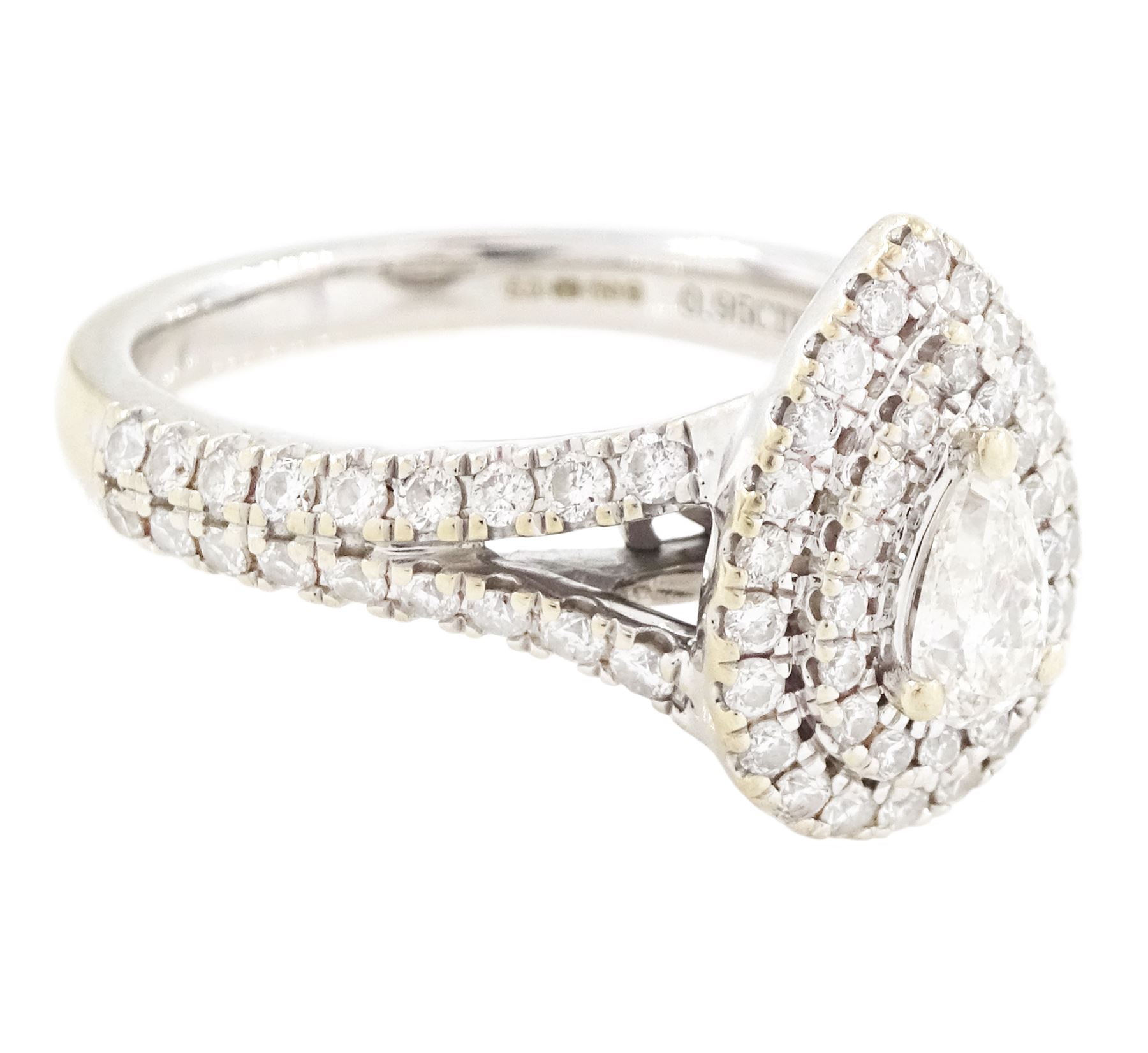 Vera Wang 18ct white gold diamond and sapphire 'Love' ring, single pear cut diamond, surrounded by two rows of round brilliant cut diamonds, split diamond set shoulders and sapphire set gallery, hallmarked, total diamond weight 0.95 carat