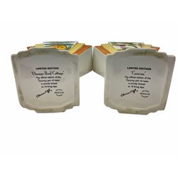 Two Wedgwood Clarice Cliff sunray vases, in Caravan design and Orange Roof Cottage design, both limited edition, H21.5cm. 