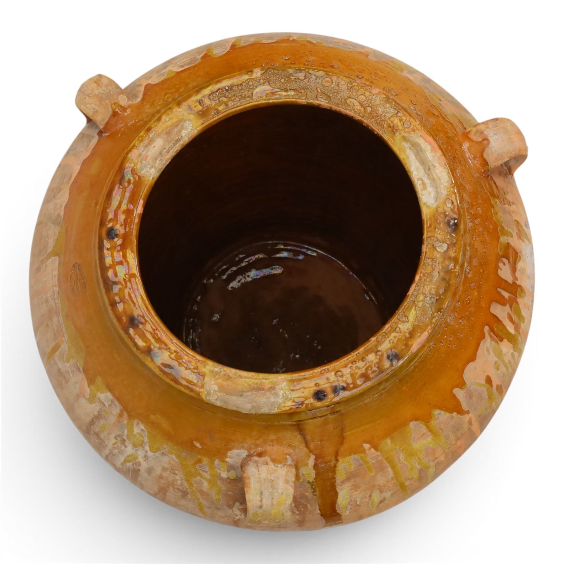 Large Spanish terracotta olive jar, of typical baluster form with drip glaze decoration and three lug handles, with impressed mark fabrica de alfareria, H58cm