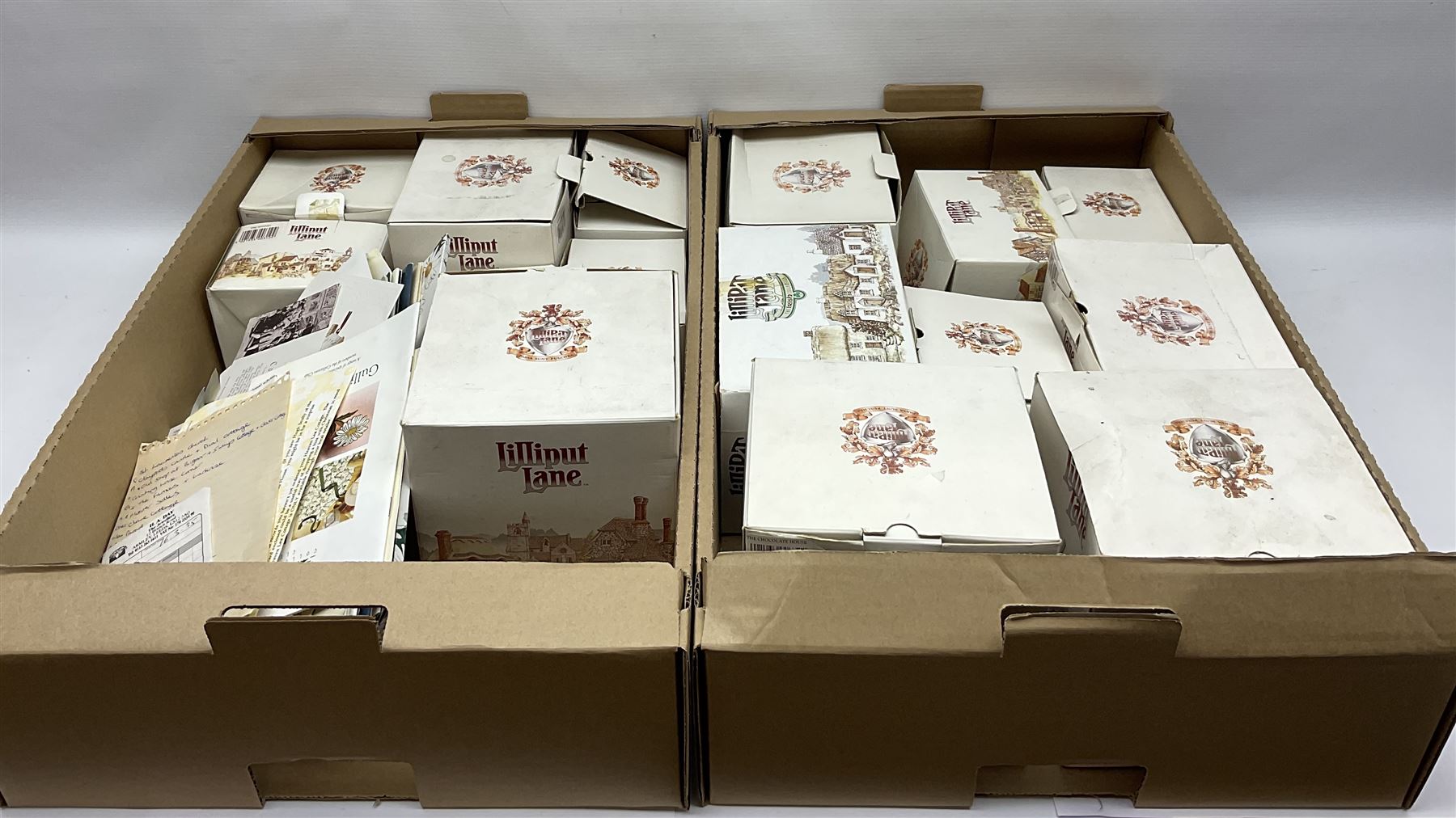 Twenty Lilliput Lanes, including The Chocolate House, Chiltern Mill, Blaise Hamlet, St Kevin Church, some with deeds and original boxes