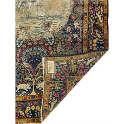 Late 19th/early 20th century Persian Tree of Life rug, blue ground with circular cartouche depicting animals and birds in landscape, the field with trailing tree of life motif decorated with flower heads, repeating design border