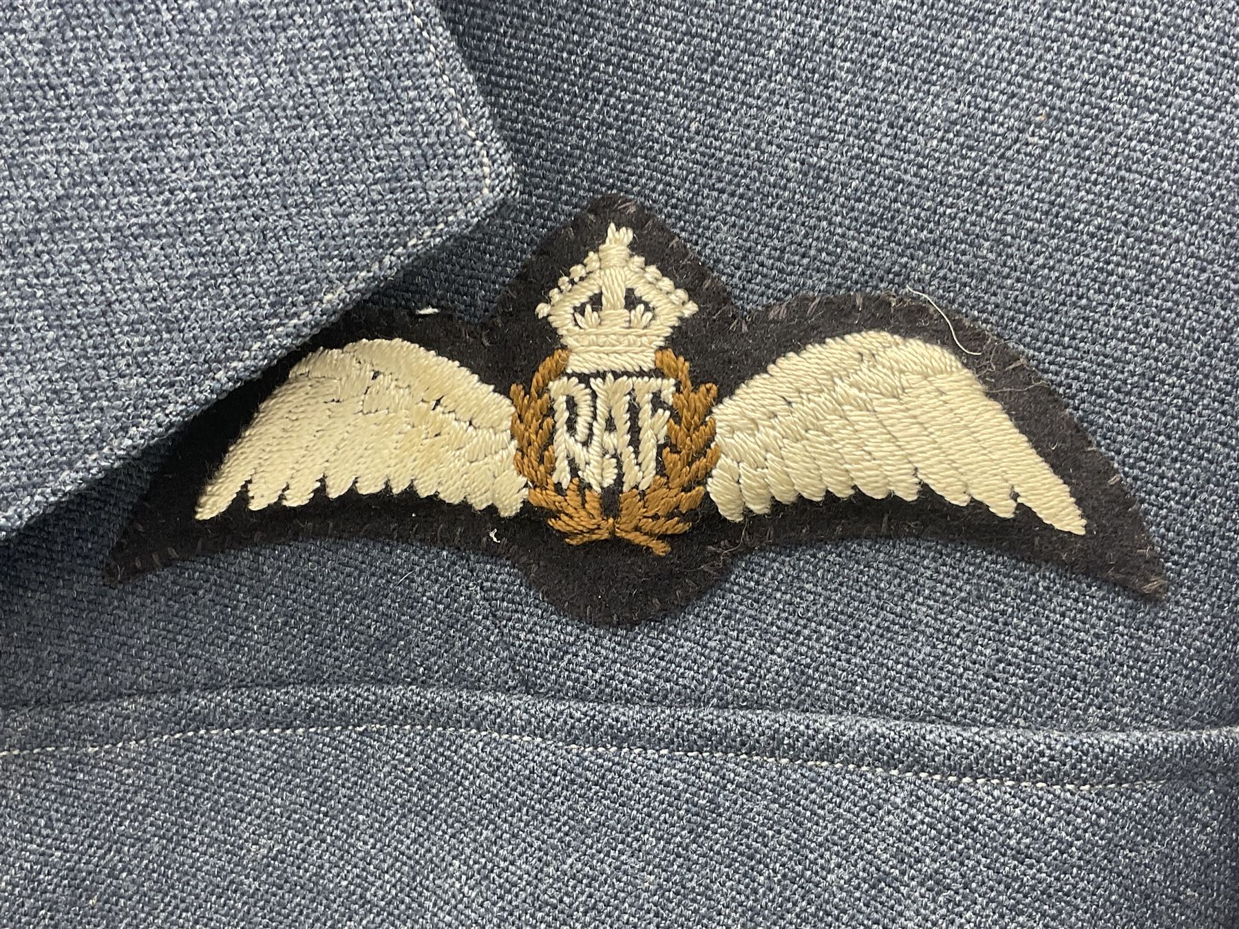 RAF pilot officer's tunic, bears Gieves label 'W.L. Dumble C/68/11406 L/6/51'