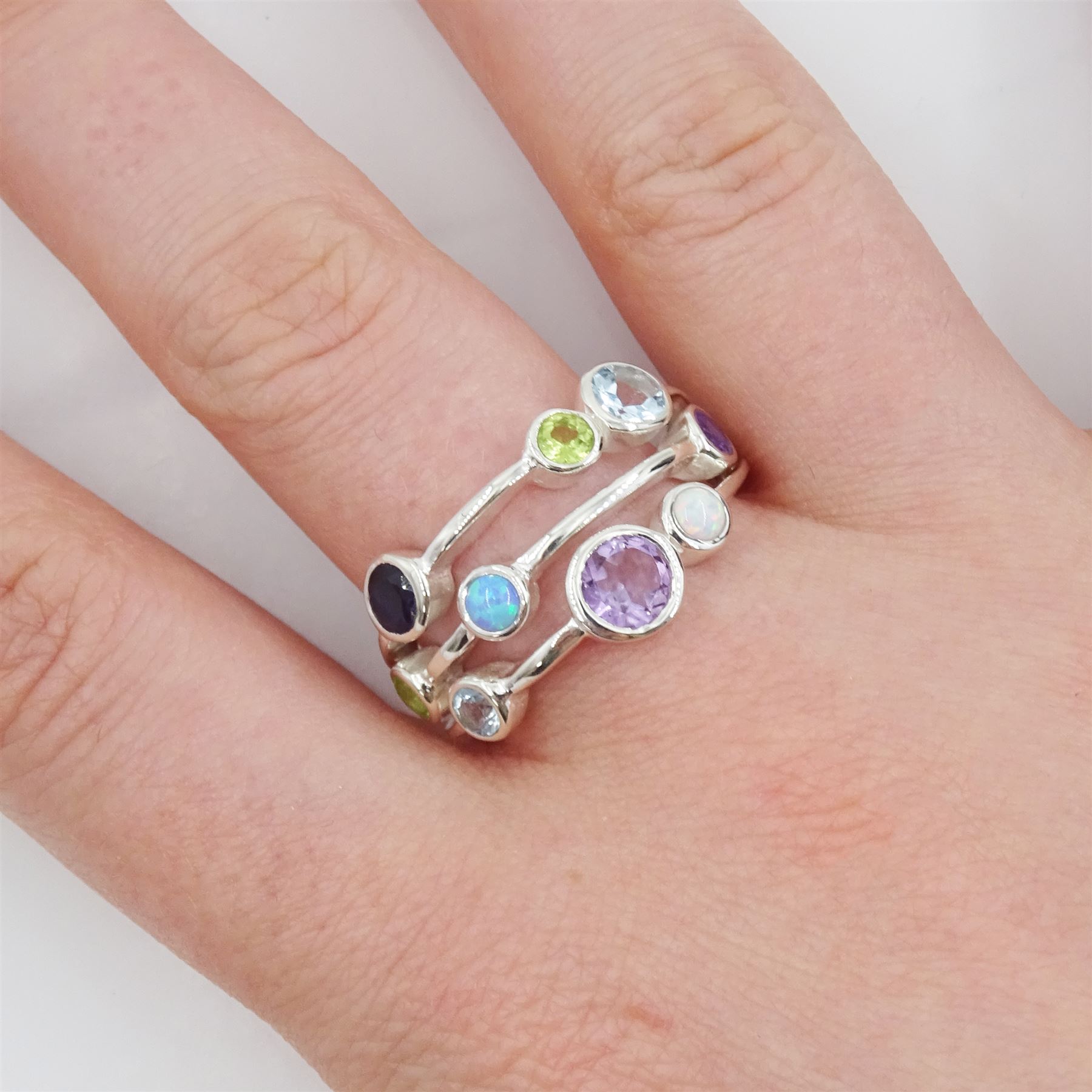 Silver opal, amethyst, iolite, topaz and peridot set ring, stamped 925 