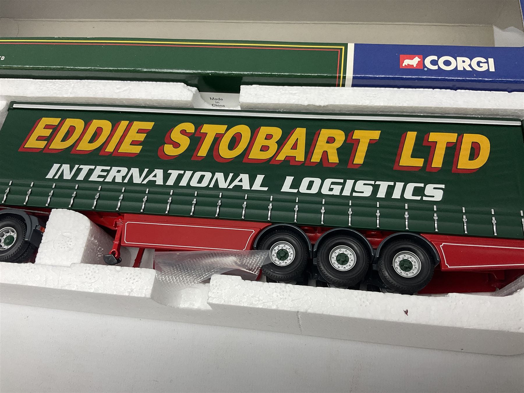 Corgi Eddie Stobart - three lorries; limited edition CC12802 Scania T-Cab Bulk Tipper; limited edition CC13201 DAF XF Super Space Cab Curtainside; and CC13401 MAN TGA Curtainside; all boxed (3)