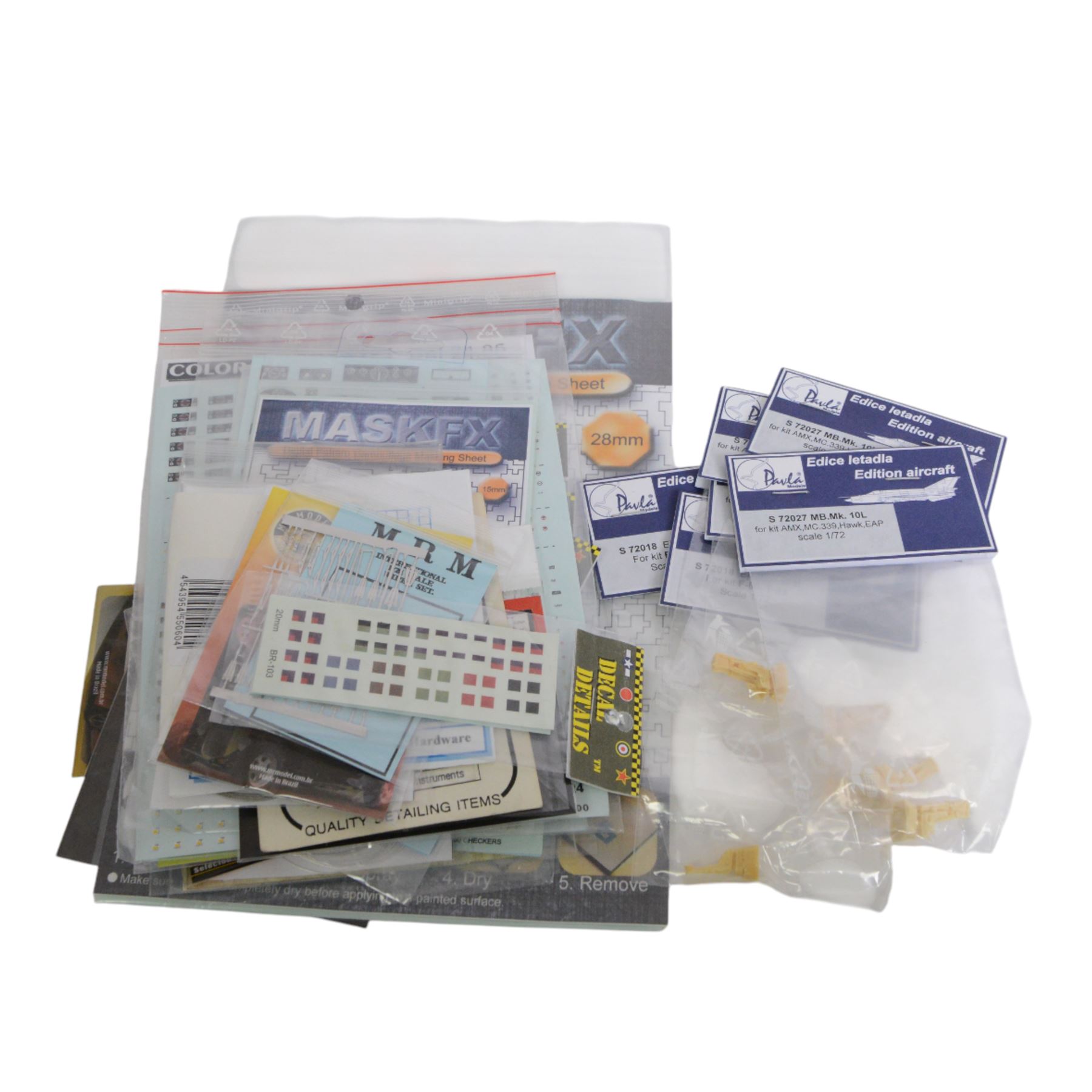 Scale modelling detailing accessories, predominantly for aircraft modelling, including masking sheets, metal parts, white metal weapons, moulded seats, decals, etc all within packaging