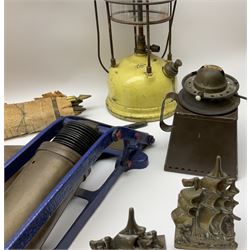 Victorian seal press machine, hand painted in gilt, together with a copper and brass fire hose, Duplex master foot pump by Kismet and other metal collectables. 
