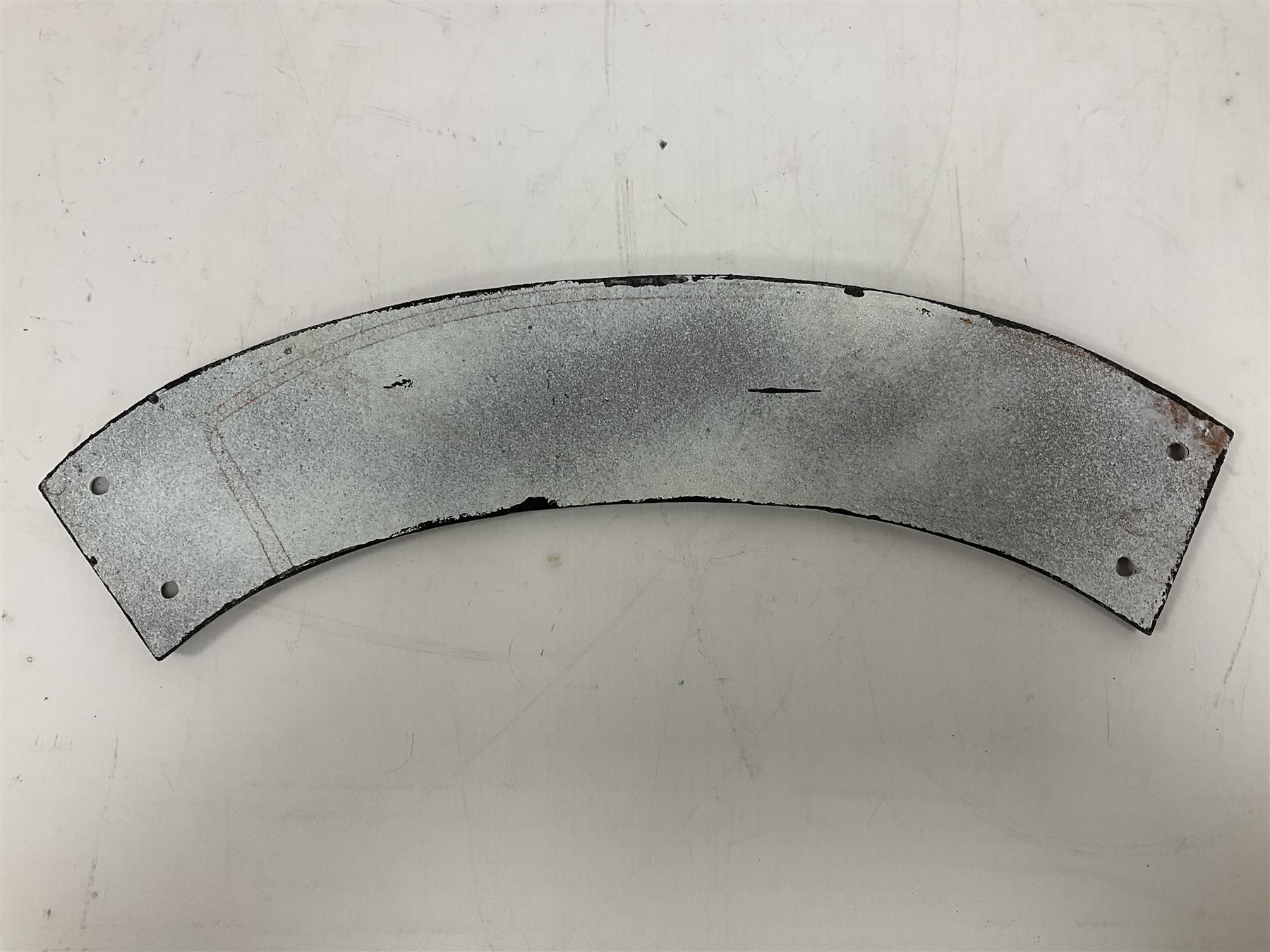 Arched cast iron Cornishman sign, L48cm