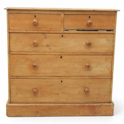 Victorian waxed pine chest, fitted with two short and three long drawers, turned wooden handles, raised on plinth base