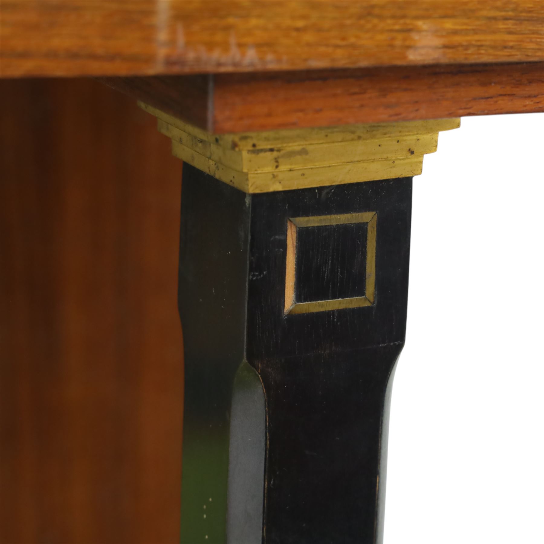 Continental Art Nouveau cocktail cabinet, the stepped cornice over a glazed upper section with panelled doors, enclosing fitted shelf, the central section with mirrored back and green baize serving surface flanked by ebonised and gilt detailed pilasters, the base fitted with cupboard doors inlaid with stylised foliate and geometric motifs, on a plinth base