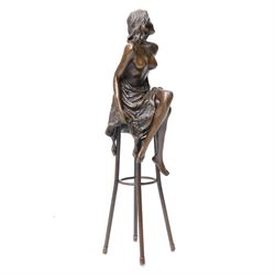 After Pierre Collinet - bronze modelled as a semi naked female figure, seated upon a chair, H27cm