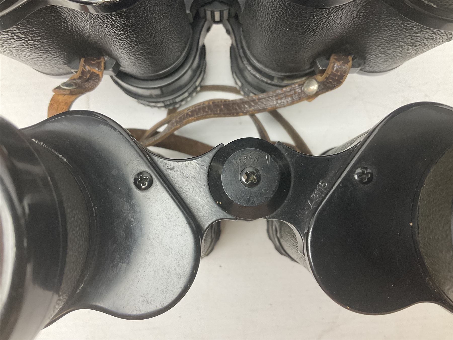 Nine cased pairs of binoculars to include Lieberman & Gortz 12x50, Frank Nipole 8x56, Uniscope, Hoya mark II 8x40, Porst 8x56 etc