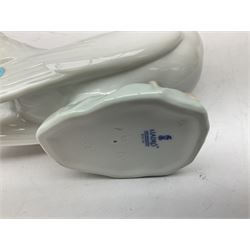 Four Lladro dove figures, comprising Taking Flight no 6288, Dove no 1015, Proud Dove no 6290 and Peaceful Dove no 6289, all with original boxes, largest example H20.5cm 