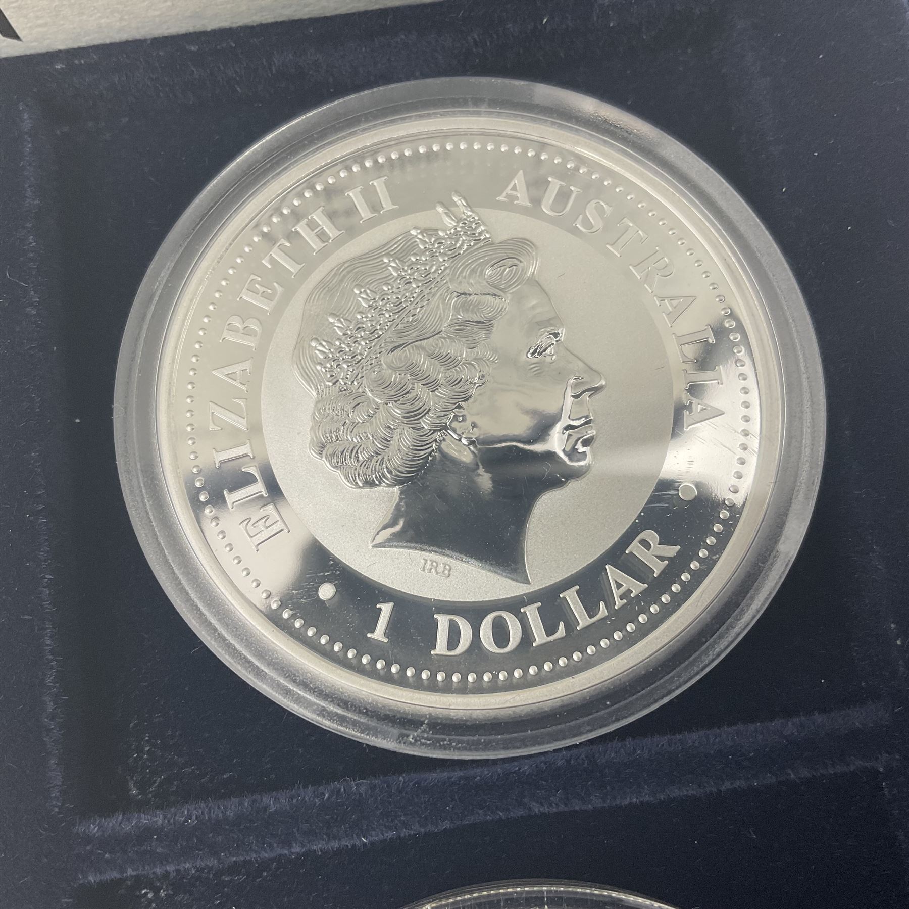 Four one ounce fine silver coins, forming 'The 2007 Famous World Silver Coin Collection', comprising United States eagle, Australian kookaburra, Chinese panda and Canadian maple leaf, cased with Westminster certificate 