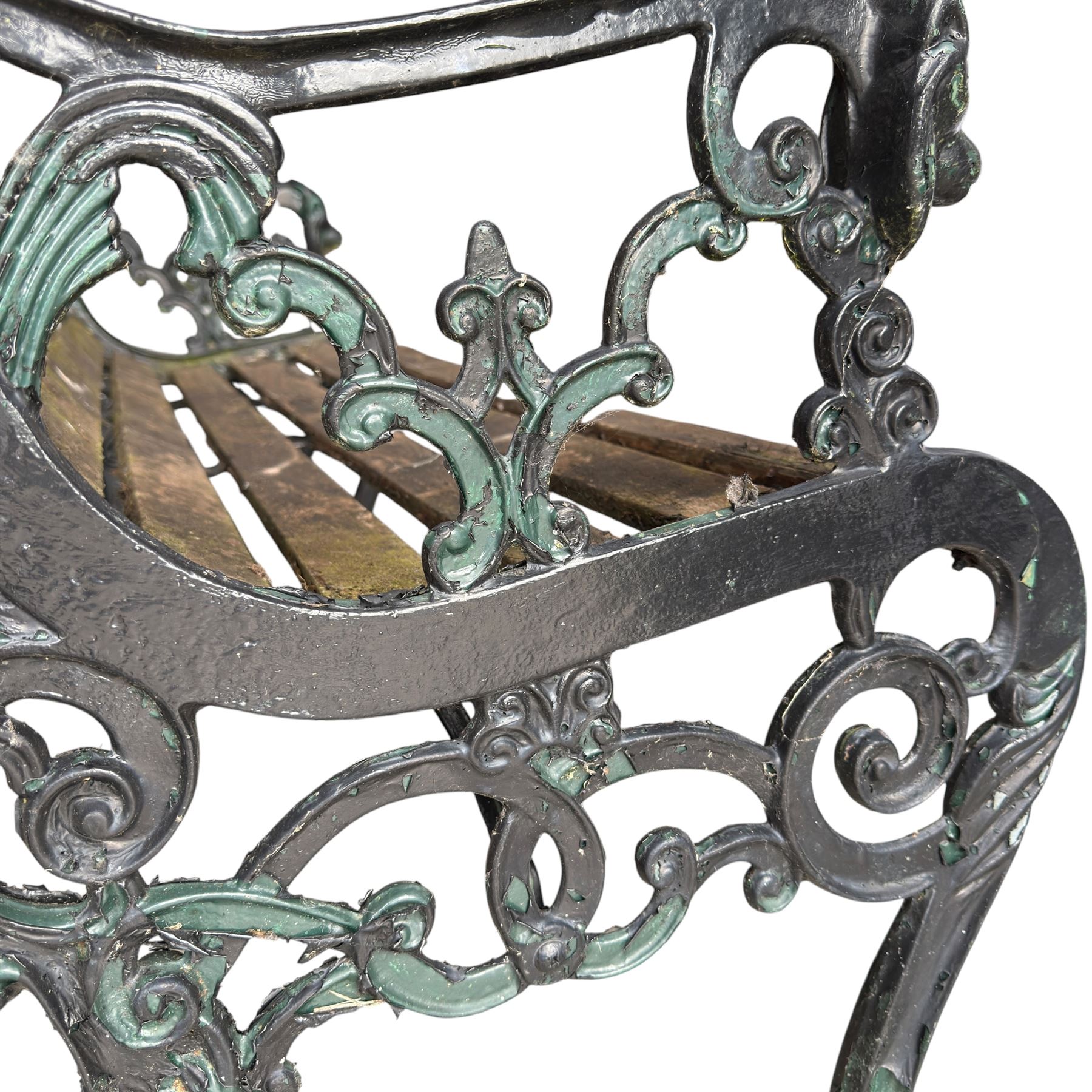 Pair of Victorian Revival Coalbrookdale design 'Dog and Serpent' pattern benches with slatted seats, the cast iron end supports of pierced and scrolling design with dog mask arm terminals