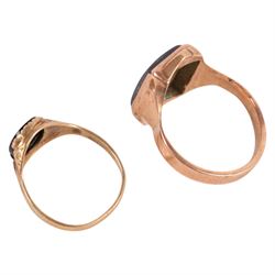 Two 9ct gold signet rings, comprising haematite example with carved warrior head and black onyx example