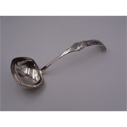 Mid 19th century Dutch silver 833 standard soup ladle, with rounded rectangular bowl, the shaped and curved stem engraved with foliate scrolls, marked with Lion Passant, Minerva Head with letter A for Amsterdam, date letter for 1847 and makers mark, approximate L30cm, approximate weight 4.52 ozt (140.6 grams)