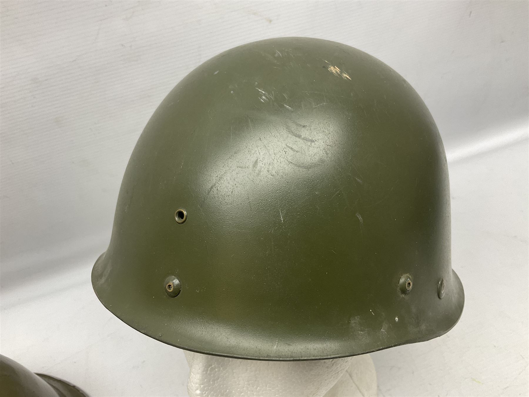 1950s French Algerian War steel helmet with liner; indistinctly marked 'S.I.A. LE EANS(?) 71R'