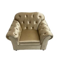 Chesterfield shaped armchair, upholstered in buttoned champagne fabric, with scatter cushions