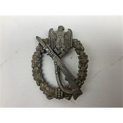 Three WW2 German badges comprising Blockade Runner War Badge and Coastal Artillery badge, both marked 'Fec Otto Placzec Berlin'; and Infantry Assault Badge; all with fixing pins (3)