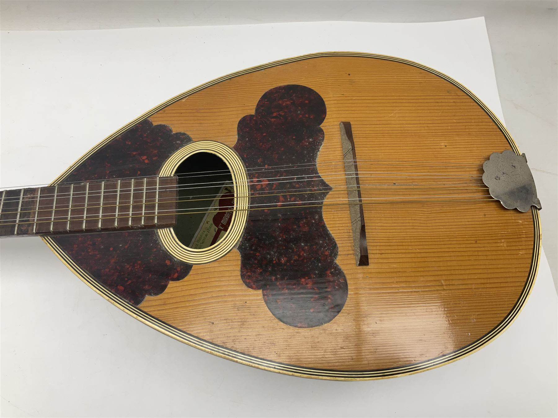 Italian bouzouki type long necked mandolin with segmented lute back and spruce top with tortoiseshell style panels; bears label 'Miroglio & Figli Sicilia Catania Italia' L99cm; and Italian lute back mandolin with segmented back and spruce top bearing label for F. De Mureda Napoli (2)