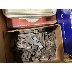 '0' gauge - large quantity of two-rail track with fixing clips including curves, straights, points, cross-overs etc; and boxed Meccano A3 Power Control Units; in four boxes