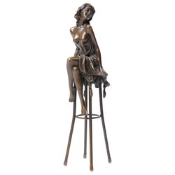 After Pierre Collinet - bronze modelled as a semi naked female figure, seated upon a chair, H27cm