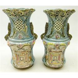  Pair of Victorian blue glazed, two handled vases with moulded, pierced and painted decoration, H:30cm    