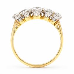 Gold diamond ring, set with five graduating old cut diamonds, stamped 18ct, total diamond weight approx 0.90 carat