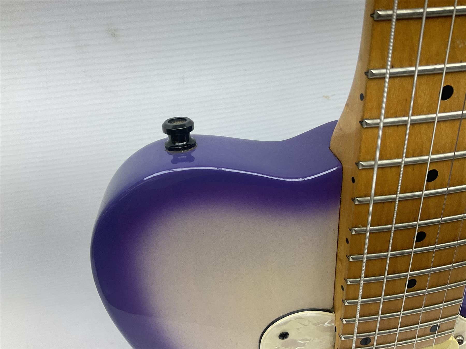Canadian Godin SD electric guitar in two-tone purple/white with bird's eye maple neck and tremolo, serial no.98455463, L100cm overall; in soft carrying case.