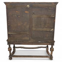 Early 18th-century burr walnut Queen Anne chest on stand, moulded rectangular top above two short and three long feather crossbanded drawers fitted with brass handles and escutcheons, on a later baluster turned stand with shaped stretcher 