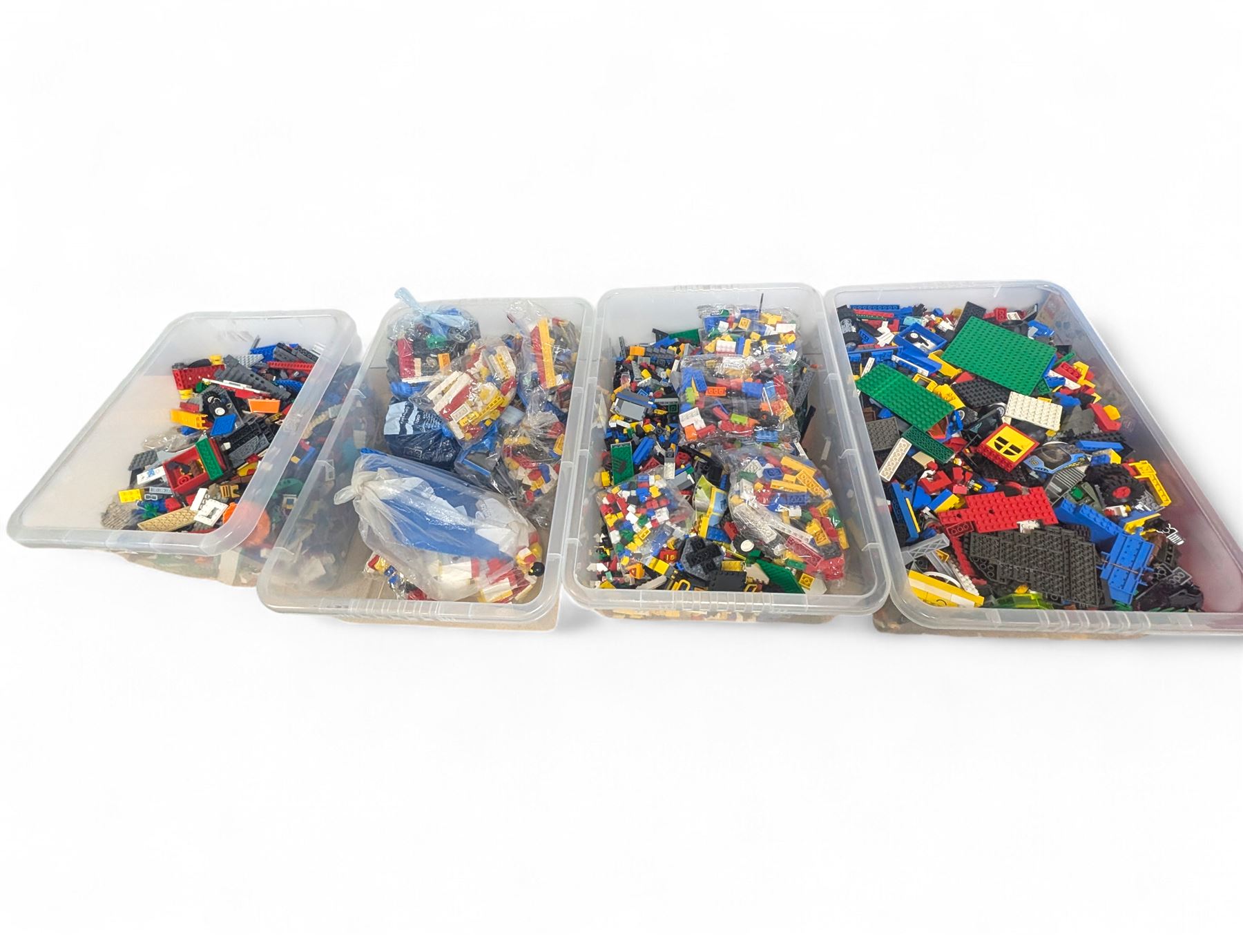 Large collection of loose Lego in four  boxes