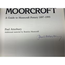 Moorcroft, 1897-1993 revised edition; an illustrated guide to Moorcroft Pottery, a hard back book by Paul Atterbury, together with a quantity of Moorcroft Collector's Club magazines