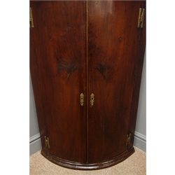  Victorian mahogany corner cabinet, projecting cornice, two cupboard doors enclosing three shelves, W67cm, H98cm, D46cm,   
