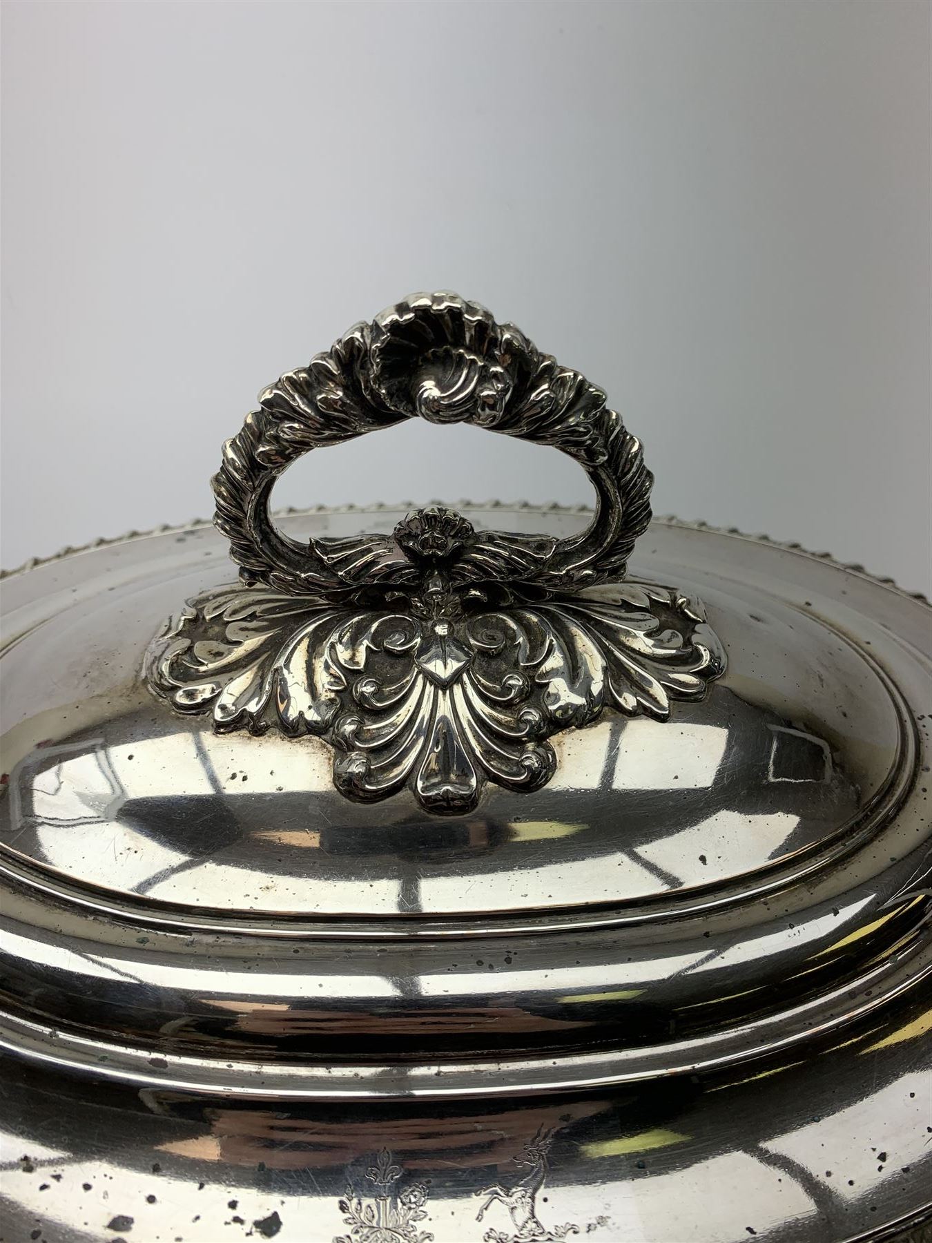 Matthew Boulton silver plated tureen and cover, the body of oval form with twin handles engraved with crest, probably for Whitgreave/Whitgrave family of Moseley Staffordshire, 'Regem Defendere Victum', (To defend the king even in his defeat/To defend the conquered king ), upon four paw feet, the cover with gadrooned rim and foliate loop handle 