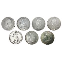 George III 1819 crown coin and six Queen Victoria crown coins dated 1889, three 1890, 1891 and 1900 (7)