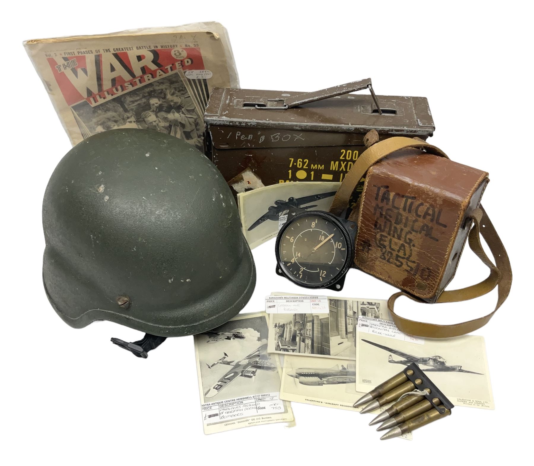 Bakelite cased Megger Insulation tester, by Evershed and Vignoles Ltd, Acton Lane Works, Chiswick, London W4, RW Munro Ltd air speed knots gauge, American green army helmet, The War Illustrated, WW2 aircraft photographic postcards, etc