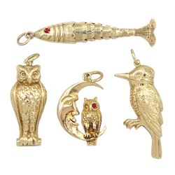 Four 9ct gold pendant charms including owl and moon, articulated fish and woodpecker, all hallmarked