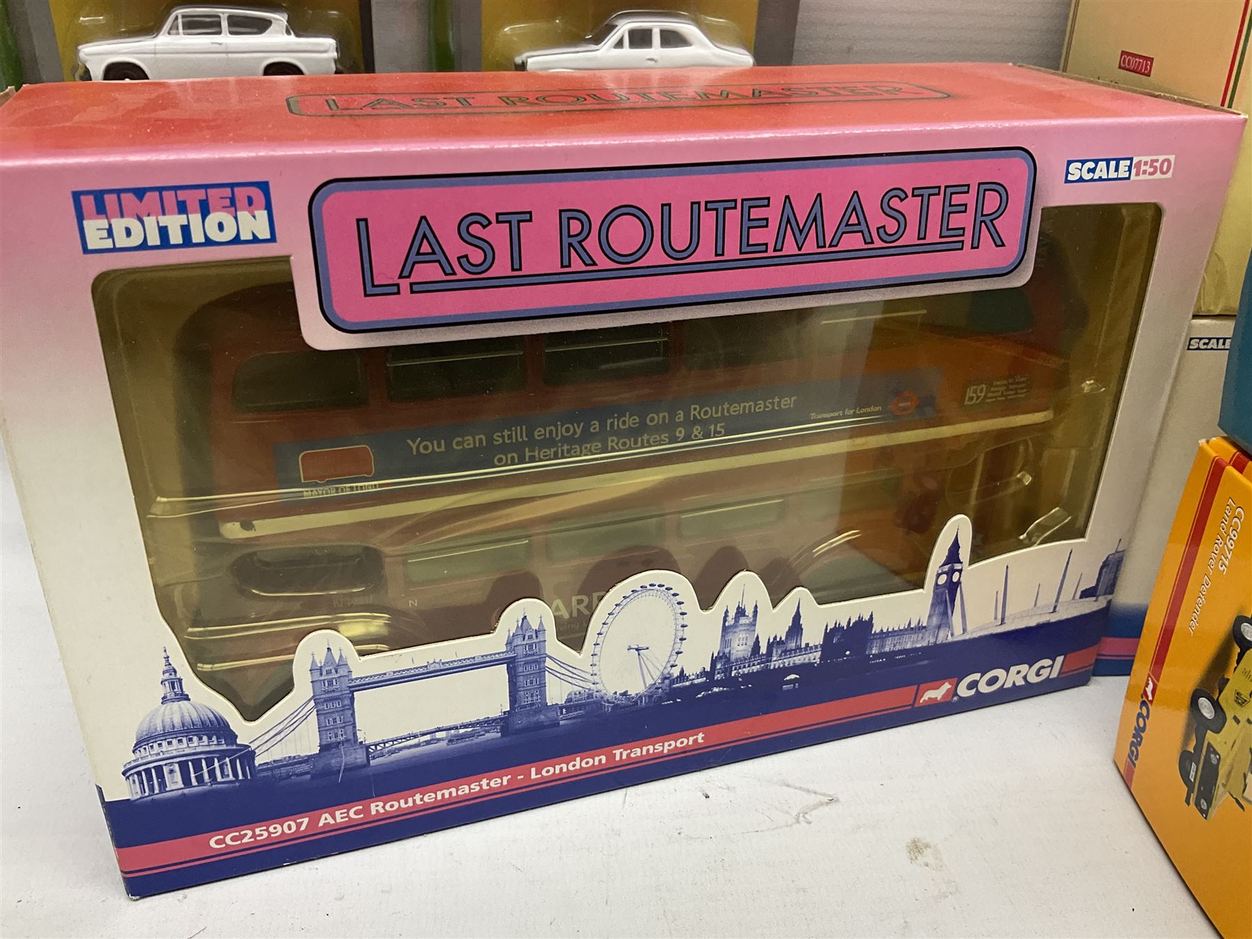 Corgi - eighteen modern die-cast models including racing cars, Land Rovers, Thornycroft Box Van, Ford Transit and Bedford Vans, Minis, Last Routemaster bus, two Trackside DIYCAST sets etc; all boxed (18)