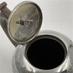 Late Victorian silver bachelors three piece tea service, comprising bullet shaped teapot, open sucrier and milk jug, each engraved with monogram surrounded by birds upon and amidst a blossoming vine, the teapot with scroll capped curved wooden handle and wooden finial to cover, hallmarked Wakely & Wheeler, London 1890, teapot including handle H12cm, sucrier H5.5cm 