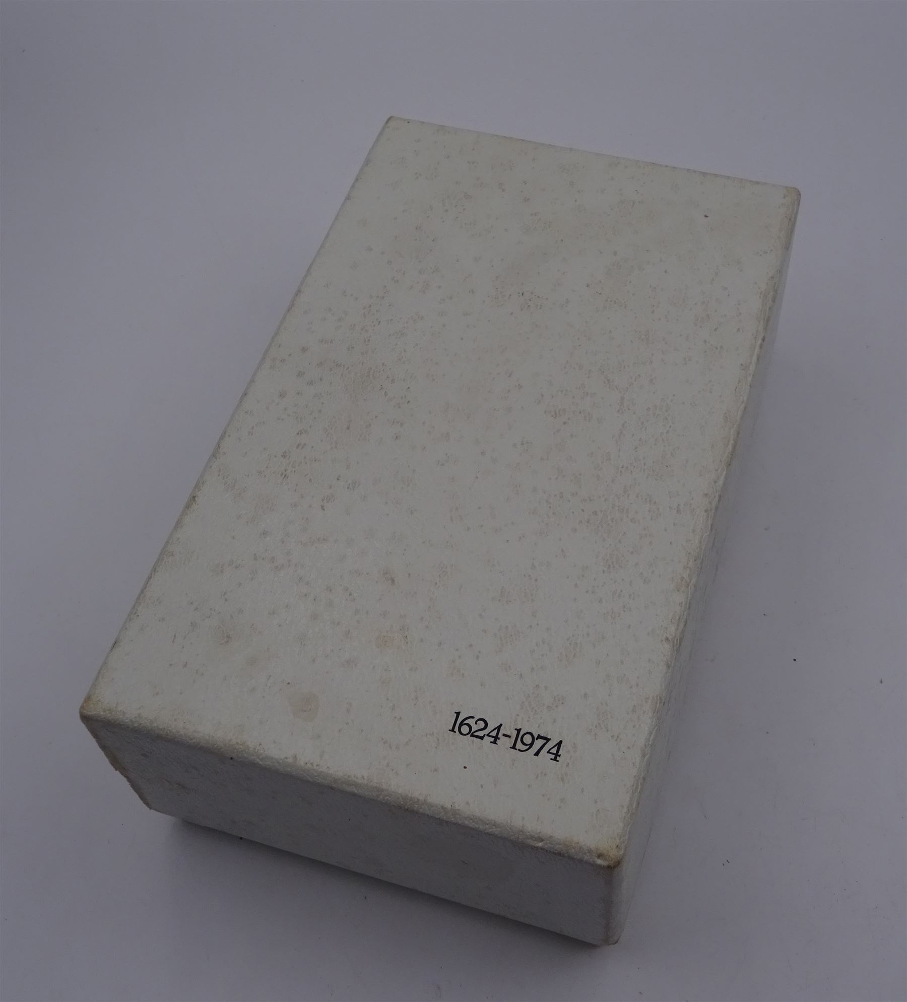 Modern limited edition silver goblet to commemorate the 350th anniversary of the Act of Parliament founding the Company of Cutlers, the tapering cylindrical bowl engraved with crest, with gilt interior and upon parcel gilt textured knopped stem and pierced circular foot, hallmarked James Dixon & Sons, Sheffield 1974, number 21/210 , in original fitted box with paperwork