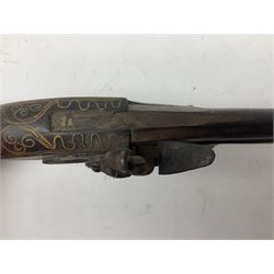 Reproduction flintlock pistol, the full walnut stock with brass filigree inlay and mounts and skull crusher butt L46cm; no visible proof marks FIREARMS CERTIFICATE REQUIRED OR RFD