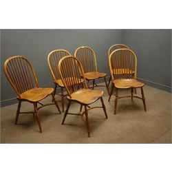  Set six elm stick hoop back chairs with wide saddle seats, turned supports and crinoline stretchers  