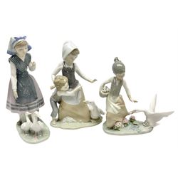 Three Lladro figures, comprising Arecely with Pet Ducks no 5202, Avoiding the Goose no 5033 and Aggressive Goose no 1288, all with original boxes, largest example H25cm