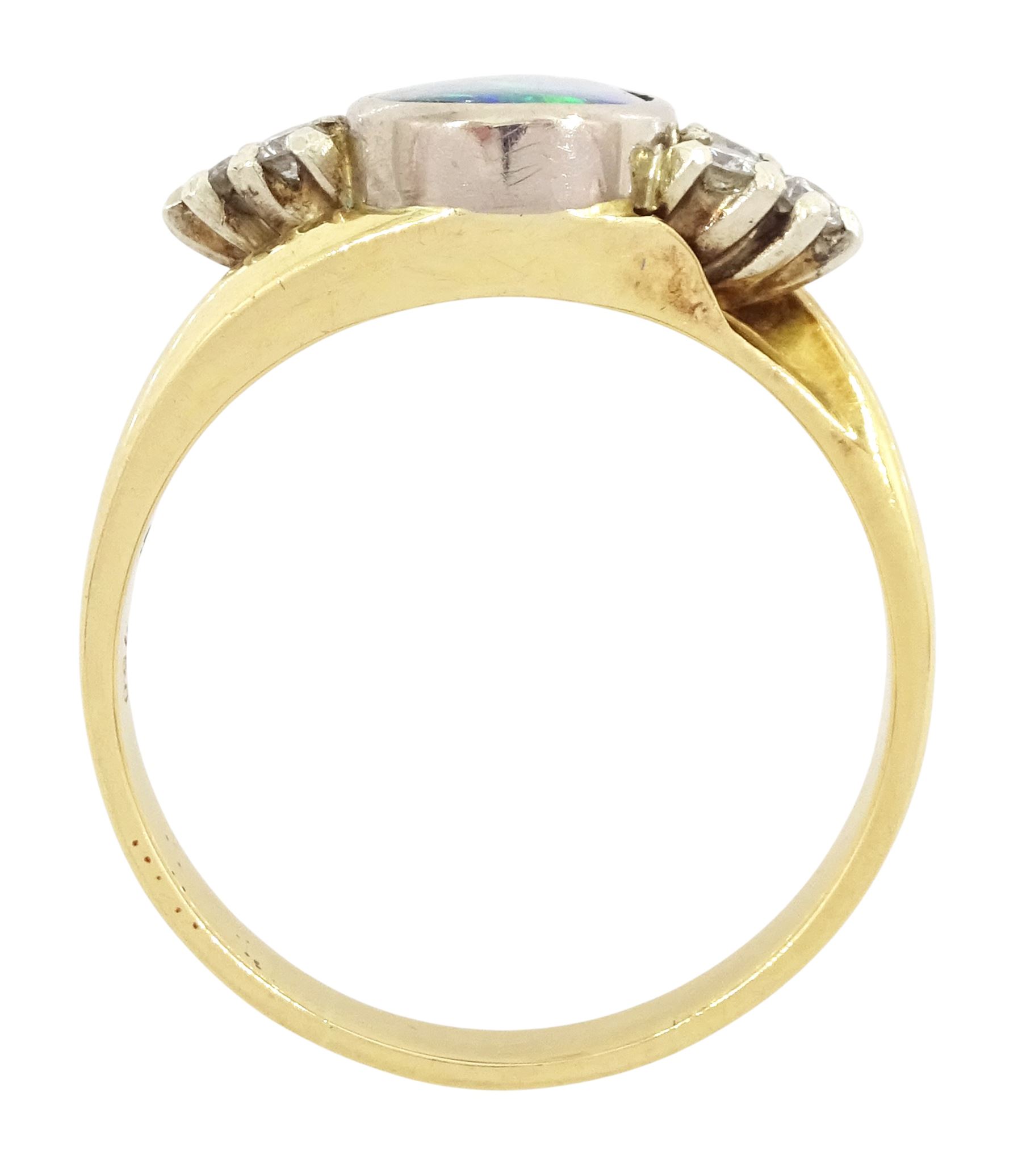 18ct gold opal and diamond ring, single oval cut opal, with three round brilliant cut diamonds set either side, stamped 750, total diamond weight approx 0.20 carat