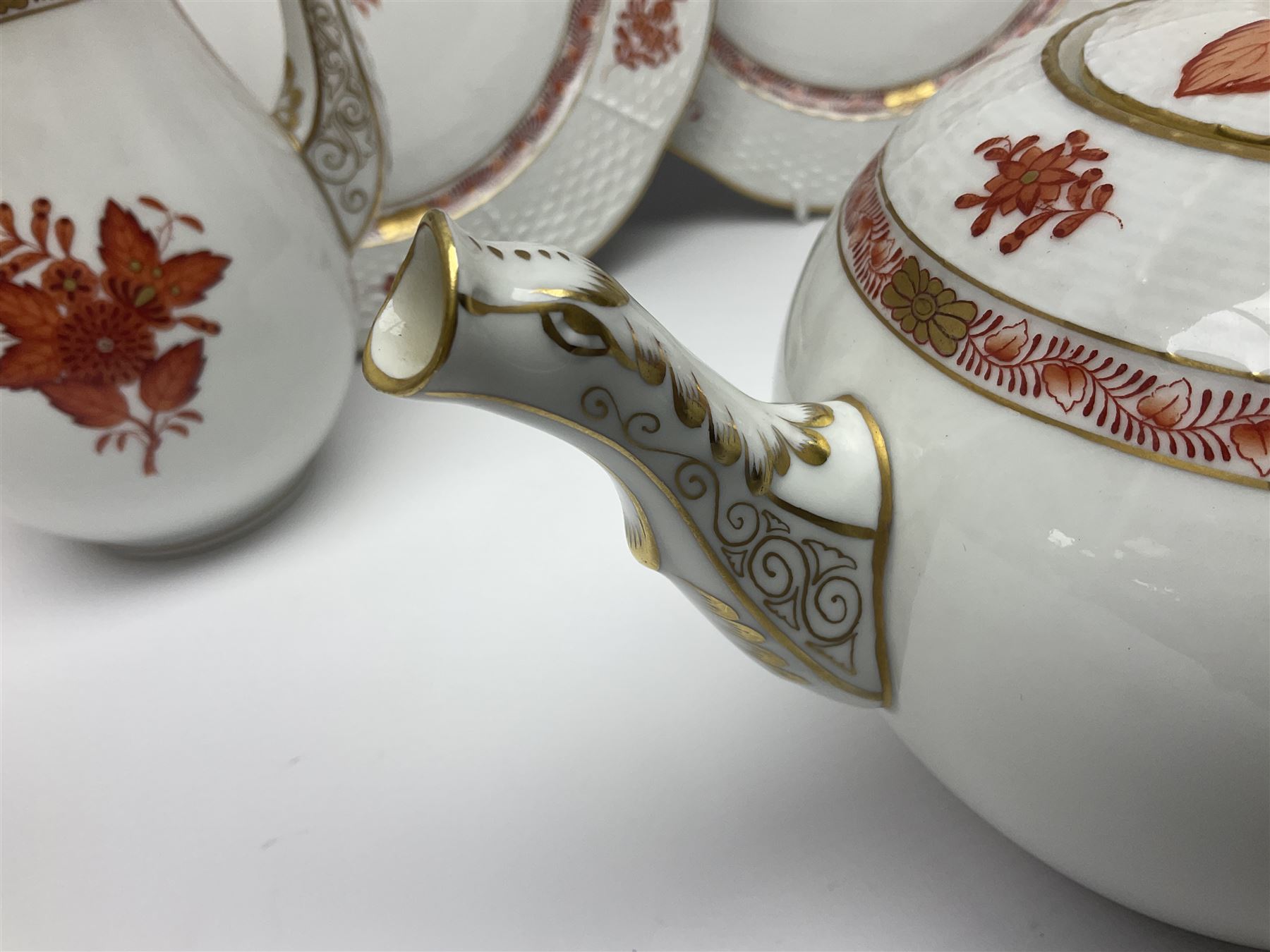 Herend Chinese Bouquet Rose pattern tea service comprising teapot, coffee pot, open sucrier, six cups and saucers, six tea plates, cream jug and stand, milk jug, two teabag holders, preserve pot, two leaf shaped dishes, four egg cups, salt & pepper pots, pair side plates and another plate