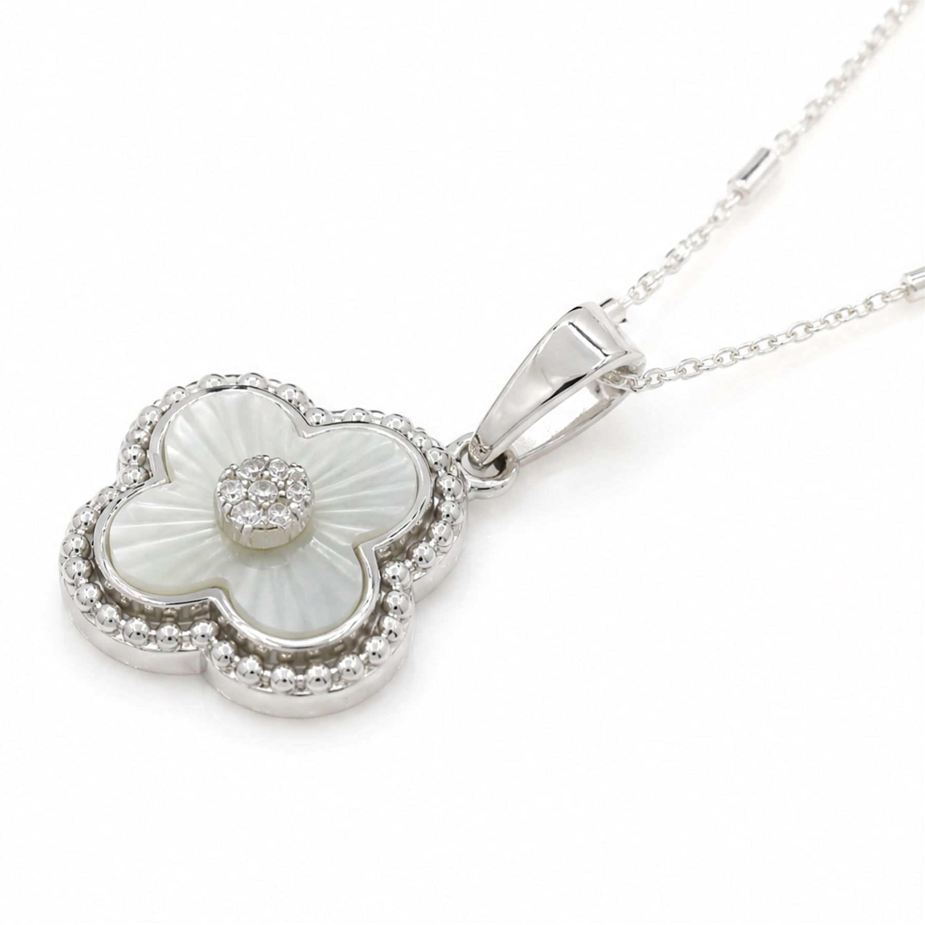 Silver cubic zirconia and mother of pearl flower head pendant necklace, stamped 925